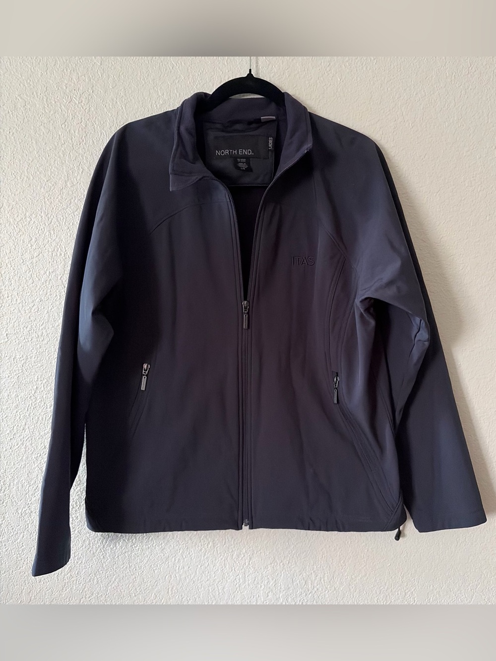 North End woman’s soft shell navy jacket size L lightweight cozy winter layering